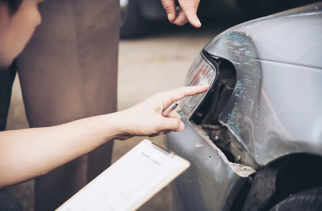 insurance agent working during on site car accident